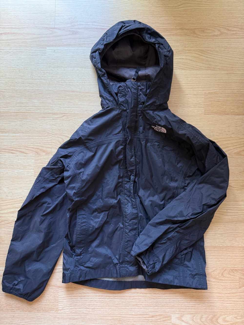The North Face Navy Hooded Rain Jacket for Kids size medium